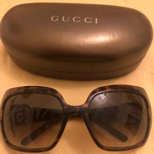 Gucci tortoise shell sunglasses with gold accents